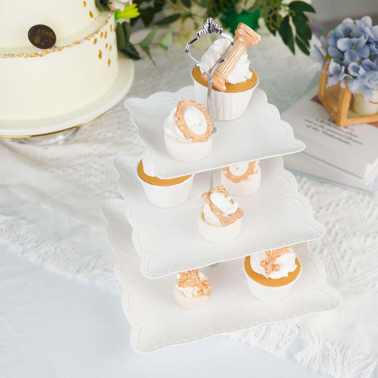 3-Tier Plastic Square Cupcake Stand Tower White - Charming Easy to Assemble Dessert Display Serving Tray Platter with Floral Embossed Scalloped Rim & Silver Handle for Tea Parties Weddings & Special O