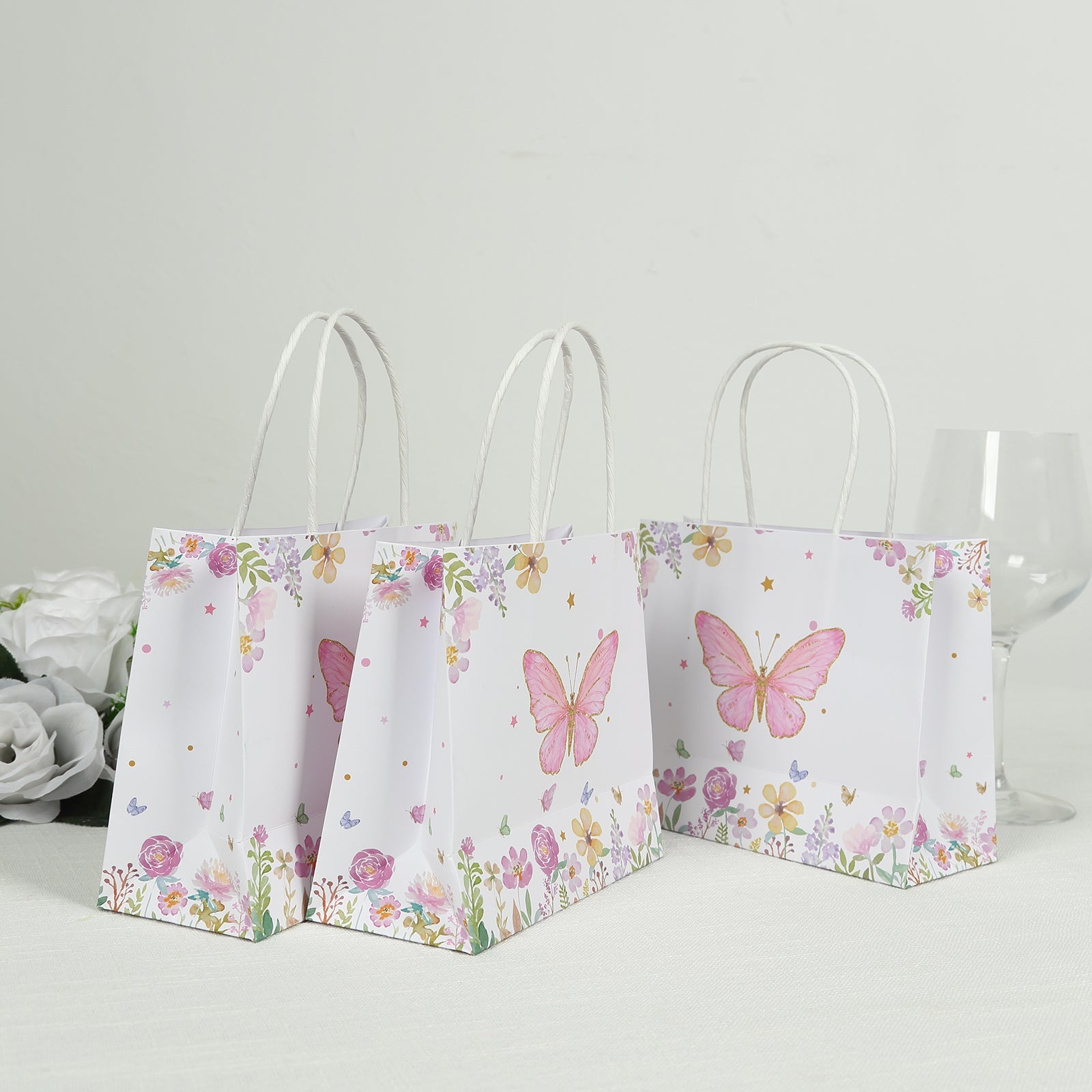 12 Pack Pink Glitter Butterfly Paper Favor Bags with Handles, Floral Print White Goodie Gift Bags - 6x7