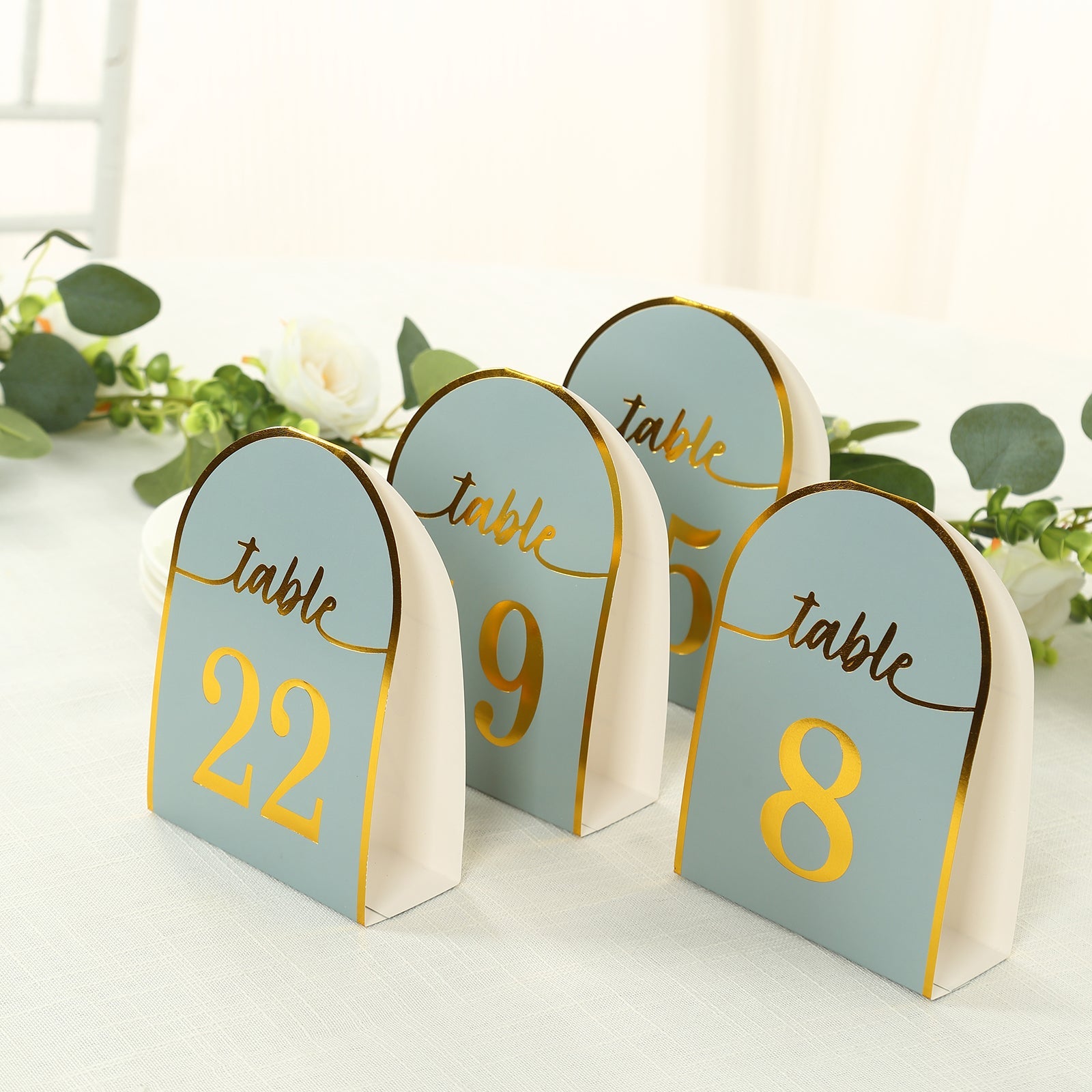 25-Pack Paper Wedding Table Numbers 1-25 Dusty Blue Arch Cutout Design - Sleek & Modern Free Standing Double Sided Table Tent Cards with Metallic Gold Foil Numbers 7