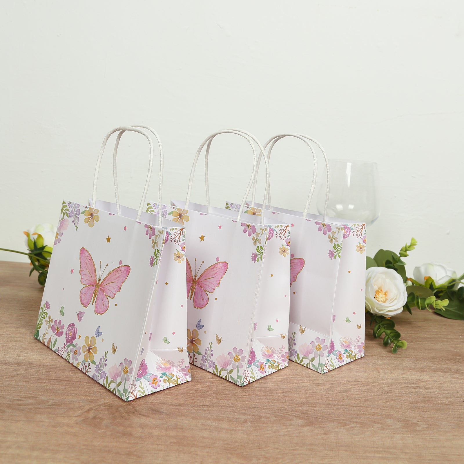 12 Pack Pink Glitter Butterfly Paper Favor Bags with Handles, Floral Print White Goodie Gift Bags - 6x7