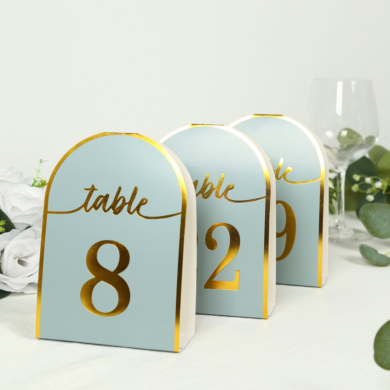 25-Pack Paper Wedding Table Numbers 1-25 Dusty Blue Arch Cutout Design - Sleek & Modern Free Standing Double Sided Table Tent Cards with Metallic Gold Foil Numbers 7