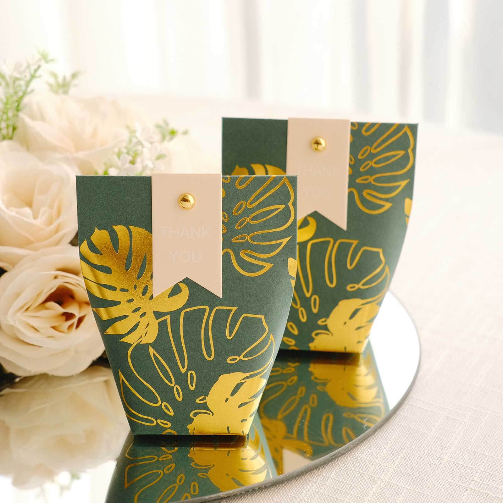 25 Pack Hunter Emerald Green Paper Pouch Candy Gift Bags With Gold Monstera Leaves Print, Party Favor Boxes with Pin and Tags - 4.5x4