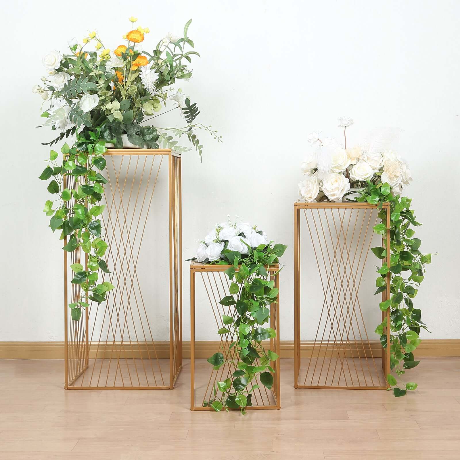 Set of 3 Gold Metal Rectangular Plant Stands with Geometric Crossed Lines Pattern, Nesting Cake Dessert Tables Floral Display Stands - 19,27,35