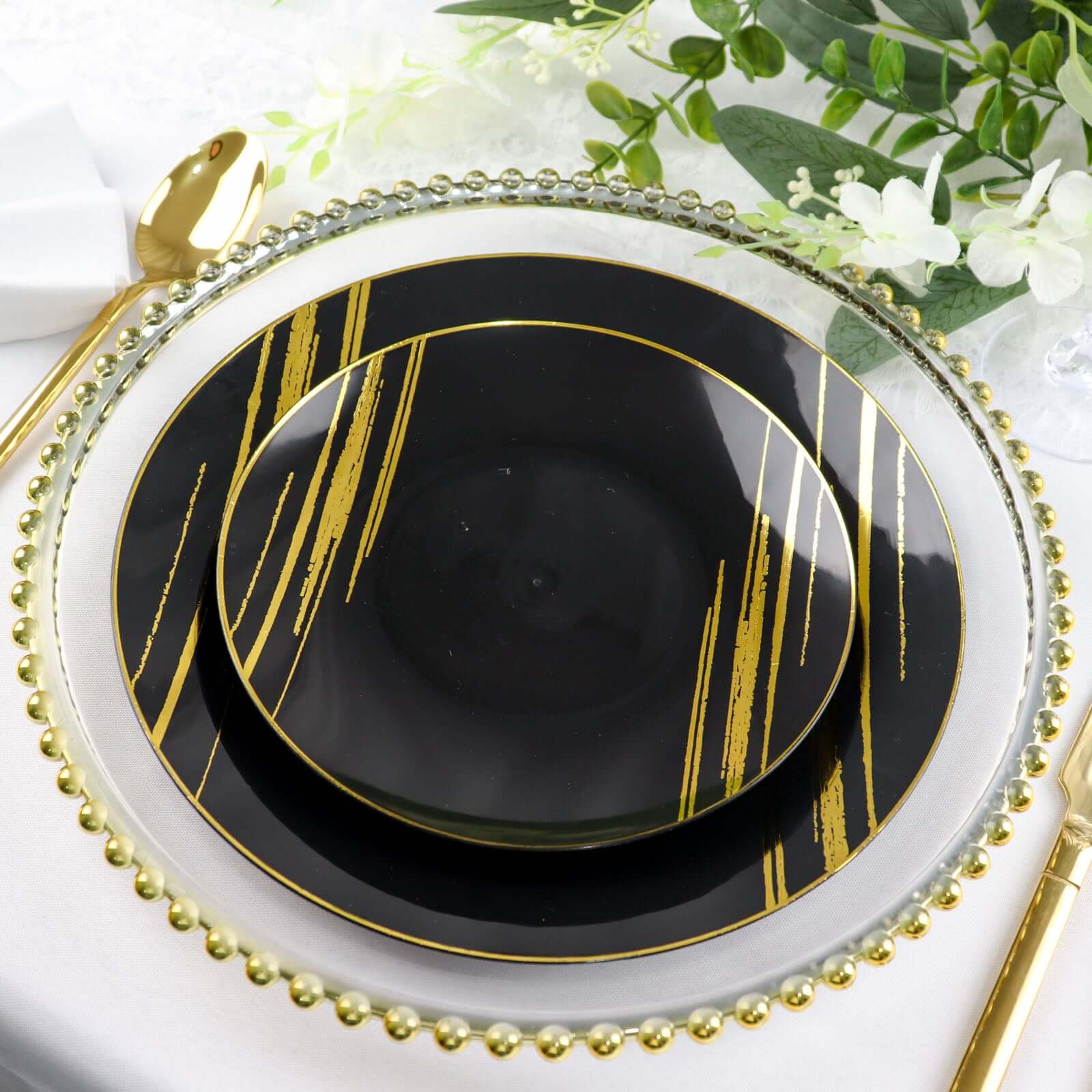 10-Pack Plastic 10 Round Dinner Plates in Black with Gold Brush Stroked Print - Disposable Party Dinnerware