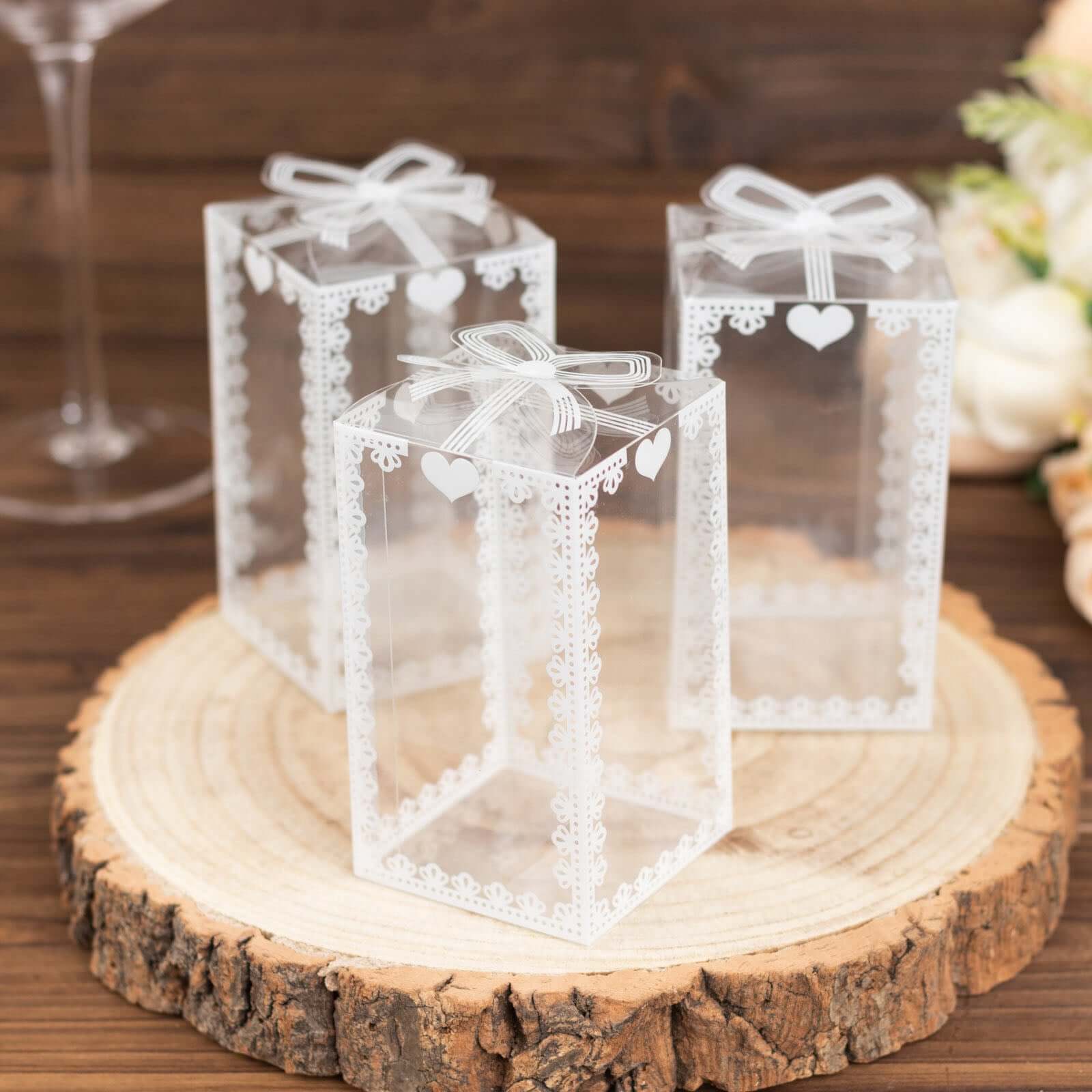 25 Pack Clear Rectangle Candy Gift Boxes With Bowknot and White Lace Pattern, 4 Transparent Plastic Party Favor Boxes - 2x2x4