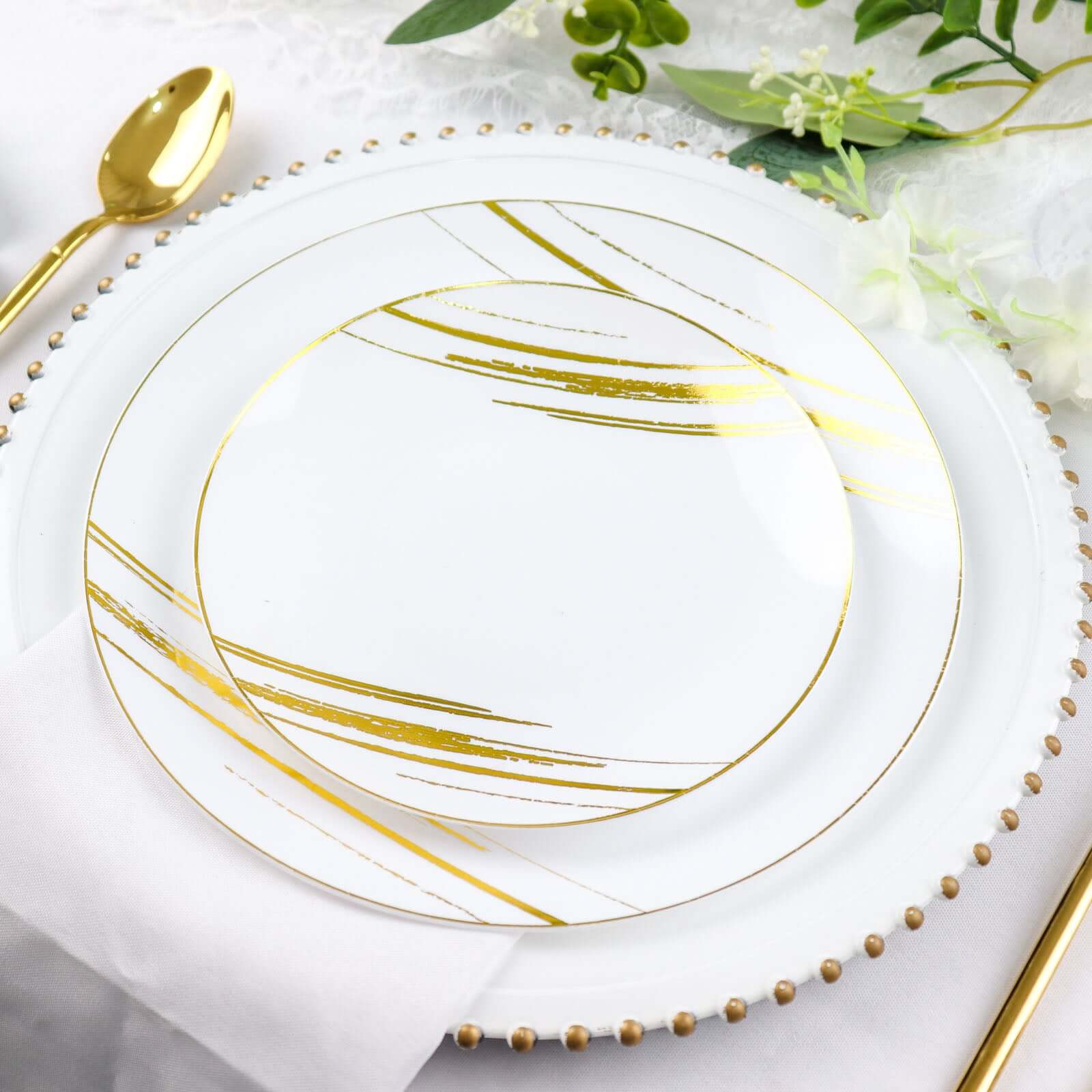 10-Pack Plastic 10 Round Dinner Plates in White with Gold Brush Stroked Print - Disposable Party Dinnerware for Modern Themed Events & Banquets