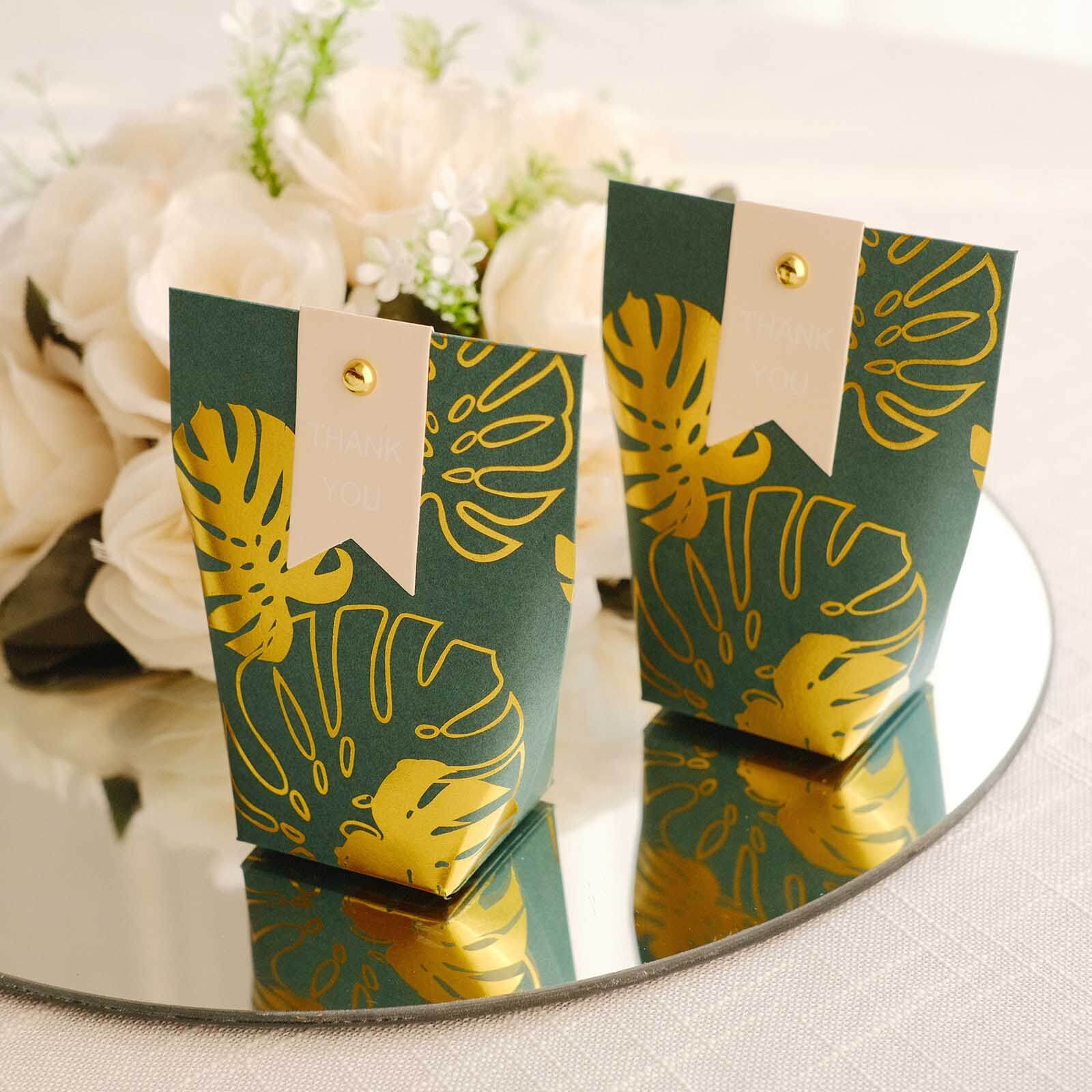 25 Pack Hunter Emerald Green Paper Pouch Candy Gift Bags With Gold Monstera Leaves Print, Party Favor Boxes with Pin and Tags - 4.5x4