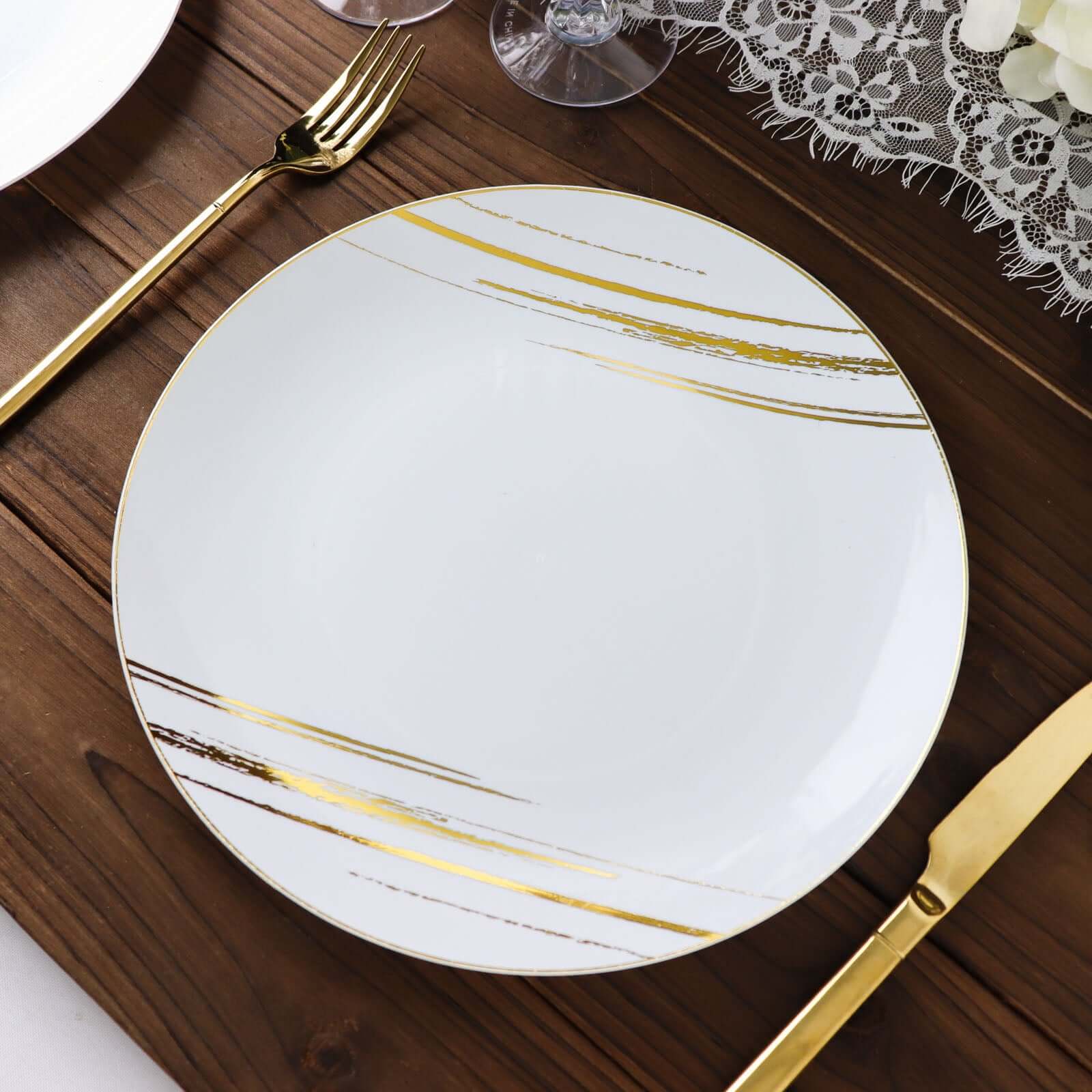 10-Pack Plastic 10 Round Dinner Plates in White with Gold Brush Stroked Print - Disposable Party Dinnerware for Modern Themed Events & Banquets