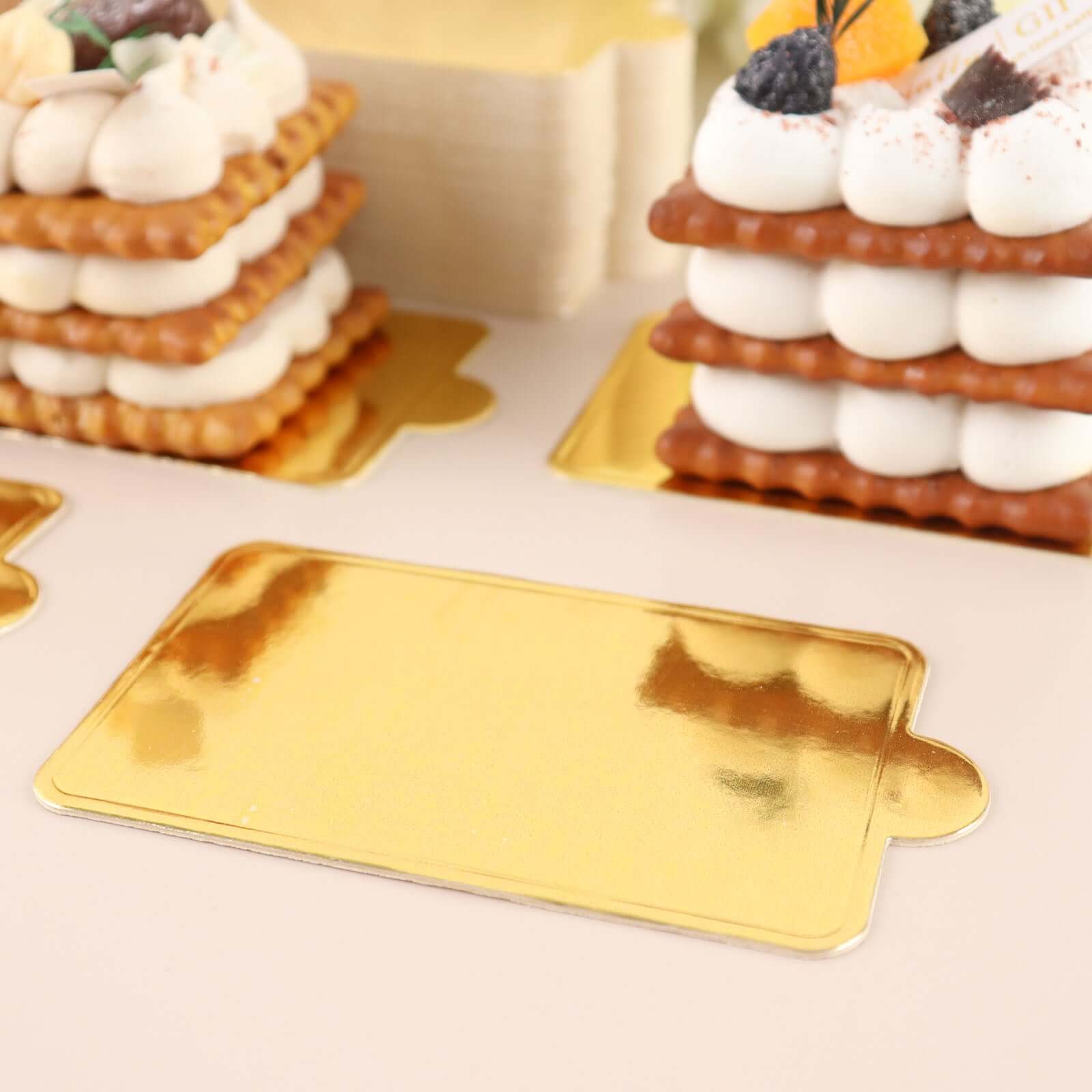 50-Pack Rectangle Cake Boards in Gold Cardboard - Grease Proof Mini Paper Trays for Pastries Cupcakes & Dessert Slices 2.4x4