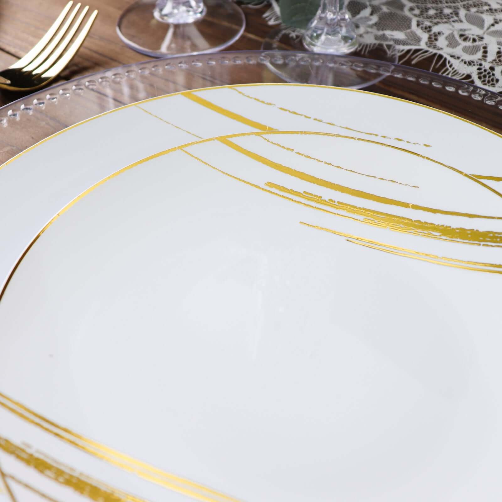 10-Pack Plastic 10 Round Dinner Plates in White with Gold Brush Stroked Print - Disposable Party Dinnerware for Modern Themed Events & Banquets