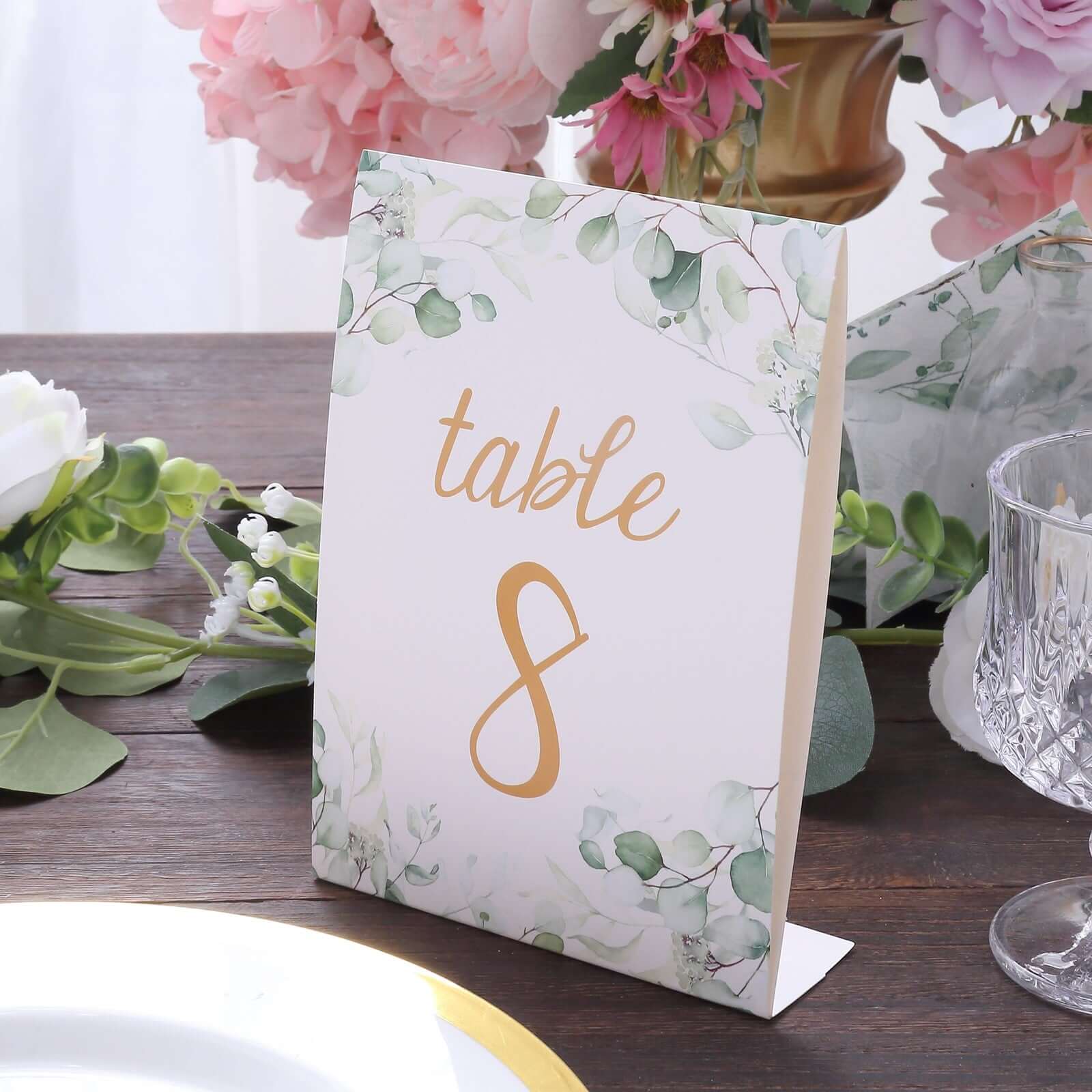 25-Pack Paper Wedding Table Numbers 1-25 White/Green Eucalyptus Leaves Design - Free Standing Double Sided Table Signs with Glam Gold Foil Numbers 7